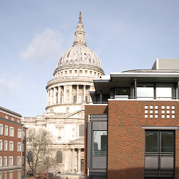 The dome of St Paul's Cathedral with Walker Crips' London office in the foreground